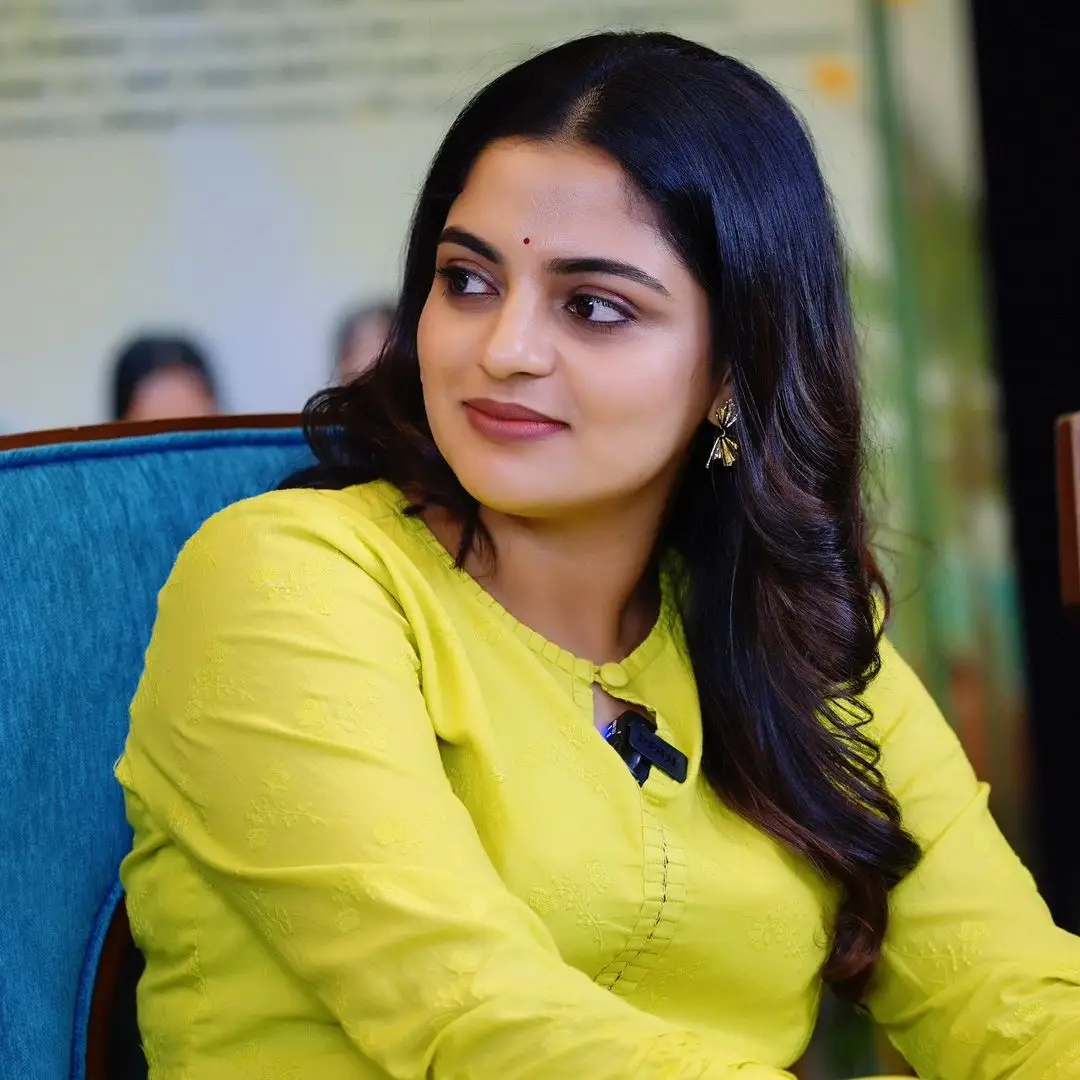 Actress Nikhila Vimal Long Hair Smiling Face Green Gown